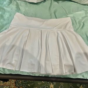 White HALARA skirt + built in shorts; size L